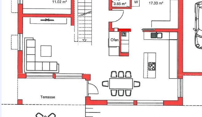 Grundriss eines Hauses: Terrasse, Wohnzimmer, Essbereich, Küche, Treppe, Garage mit Auto.
