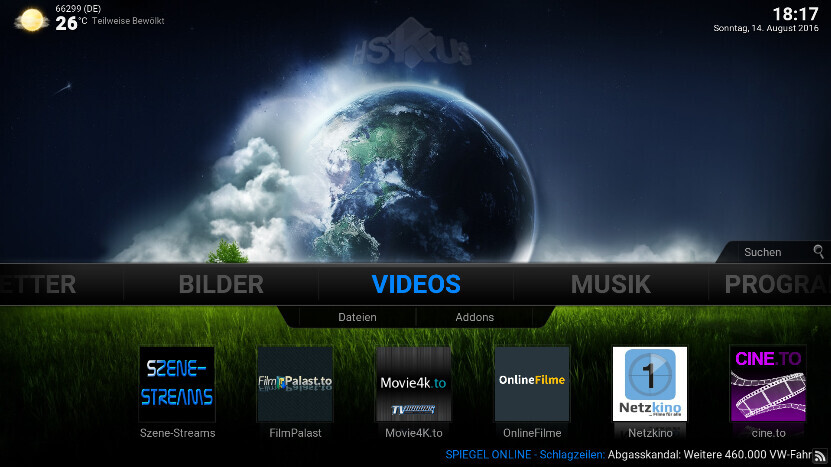 Website background with Earth in space, blue VIDEOS menu over green grass