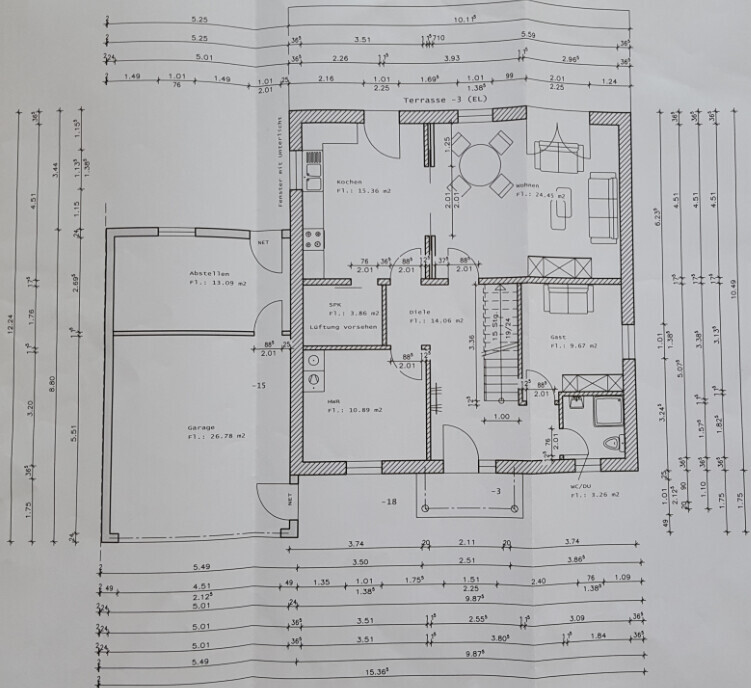 Floor plan of a house: kitchen, living room, bathroom, storage room, garage, terrace.