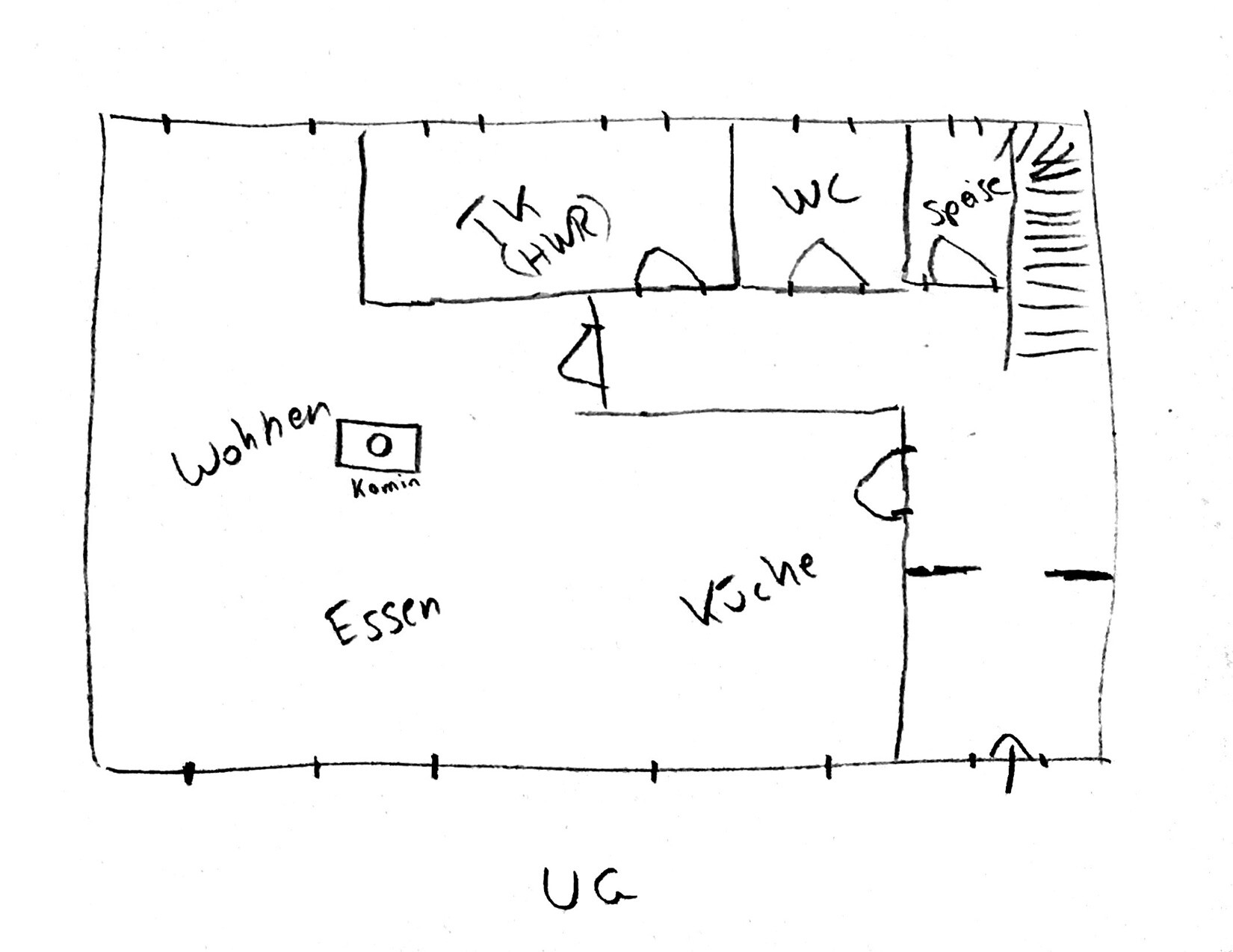 Hand-drawn floor plan of a house with living room, kitchen, dining area, and WC