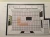 2D floor plan of a house with room layout, walls, and doors
