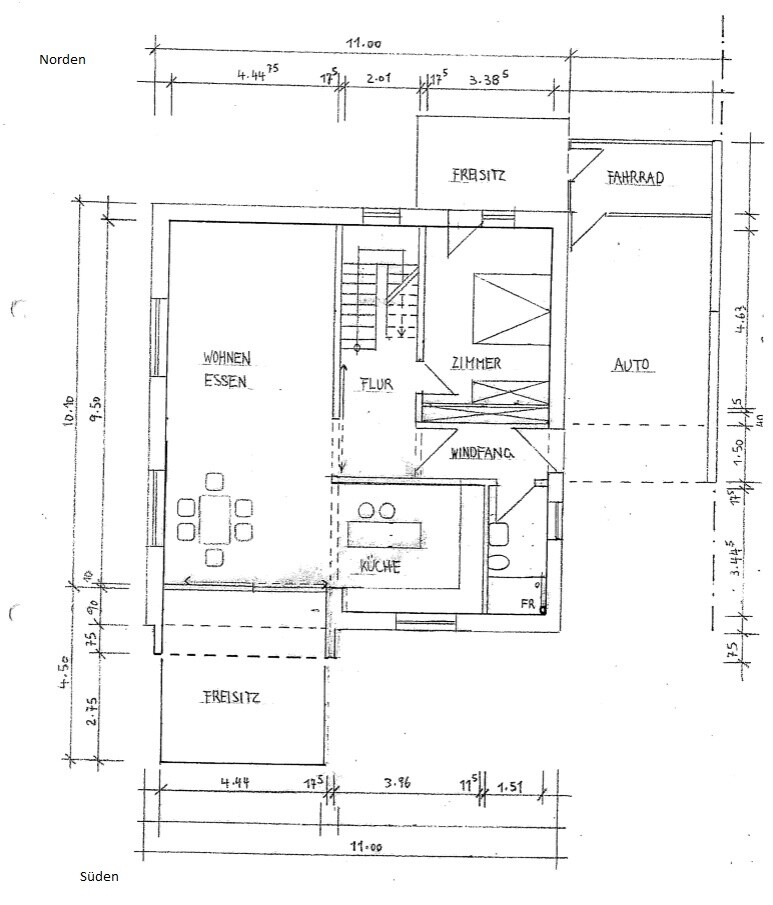 Floor plan of a house with living and dining area, kitchen, hallway, room and garage.