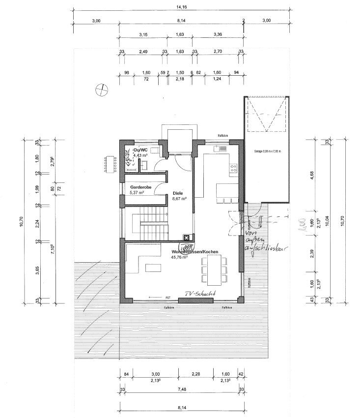 Floor plan of a house with living/dining/kitchen area, foyer, wardrobe, WC, staircase, and garage.