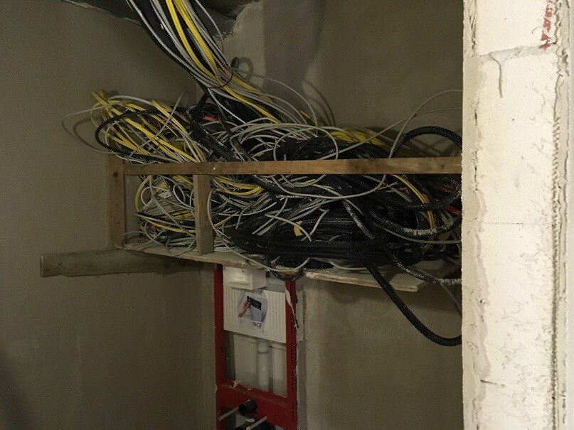 Tangled cable bundles and installation frame in shell construction