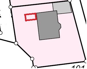 Site plan of a property with building footprint and property boundaries
