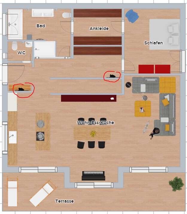 Floor plan of an apartment with terrace: living-dining-kitchen, bedroom, bathroom; two black figures marked.