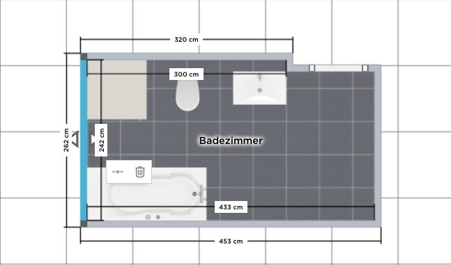 2D bathroom floor plan with bathtub, toilet, and sink.