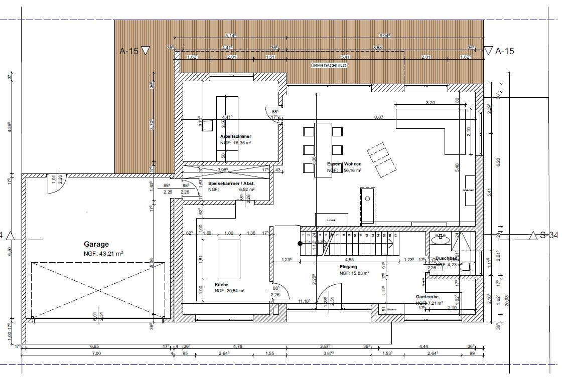Grundriss eines Hauses: Küche, Wohnen/Essen, Arbeitszimmer, Garderobe, Garage und Eingang
