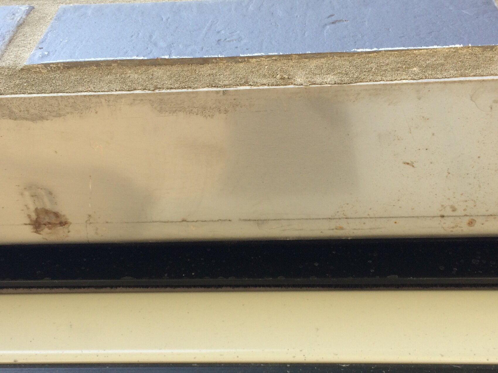 Close-up of a roof sheet on a construction site surface with rust spots