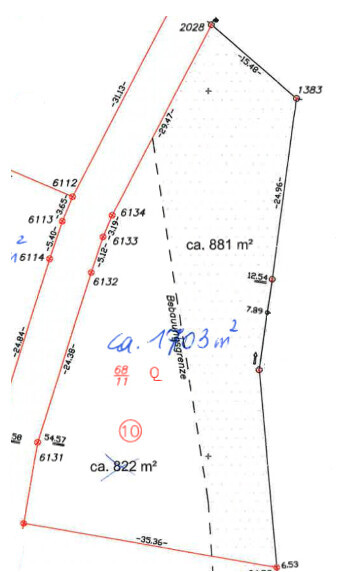 Site plan of an irregularly shaped property with red boundary lines and area markings