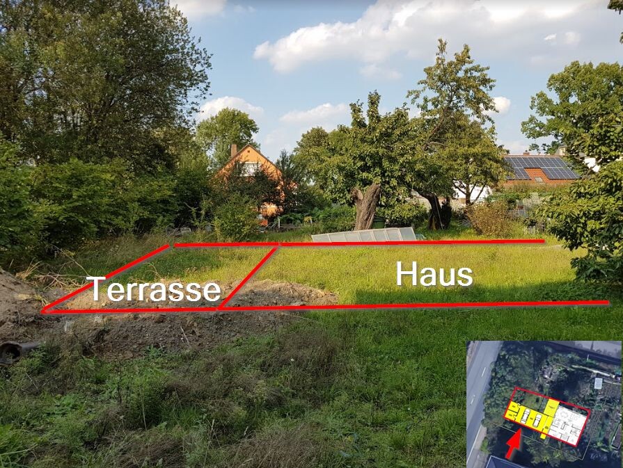 Green property with house in the background; red lines mark terrace on the left and house on the right.