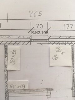 2D floor plan of a small room with dimension lines and component markings