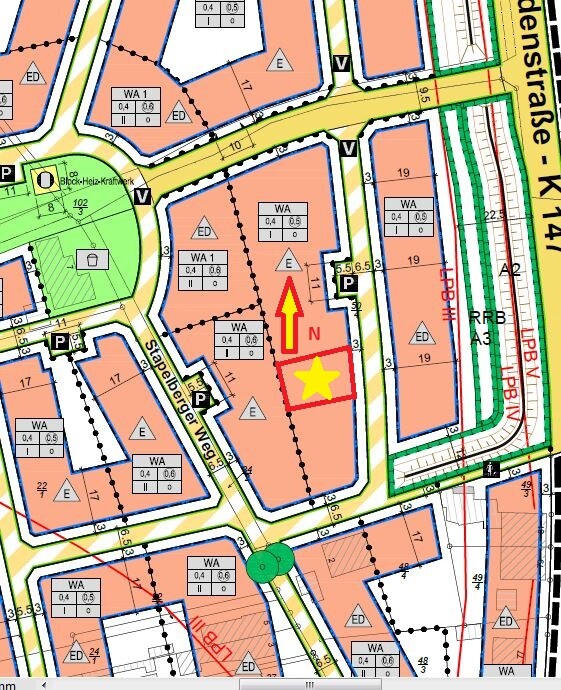 Site plan of a developer area with plots, streets and location marked (star)