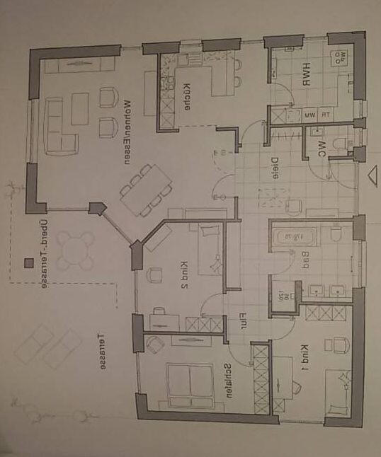 Floor plan of a house with living room, kitchen, hallway, bathroom, toilet, bedroom, and dining area