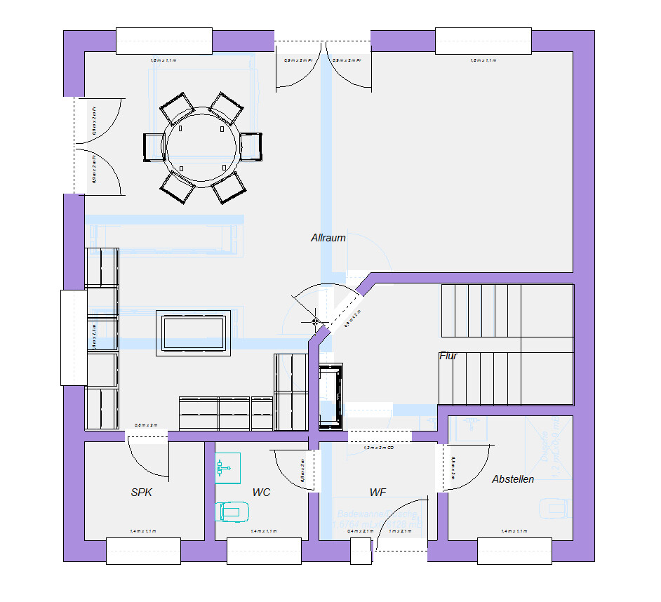 Floor plan of a house with open living area, kitchen, living room, bathroom and staircase