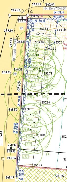 Site plan with outlines, contour lines, and measurements.