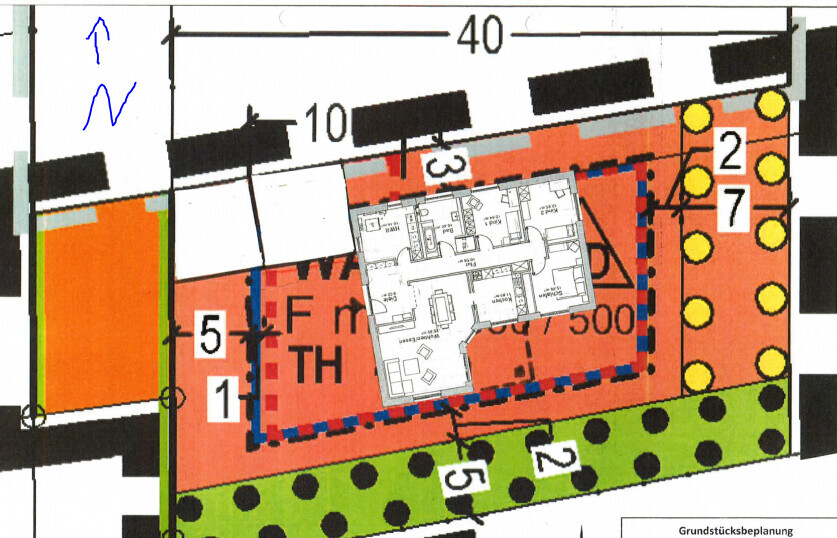 Plot plan with building, garden, and driveway.