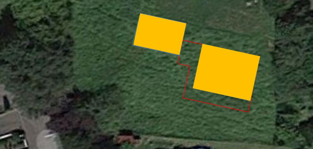 Aerial photo of a plot with two yellow building areas and red outline