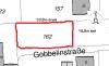 2D floor plan sketch of a house with red marking