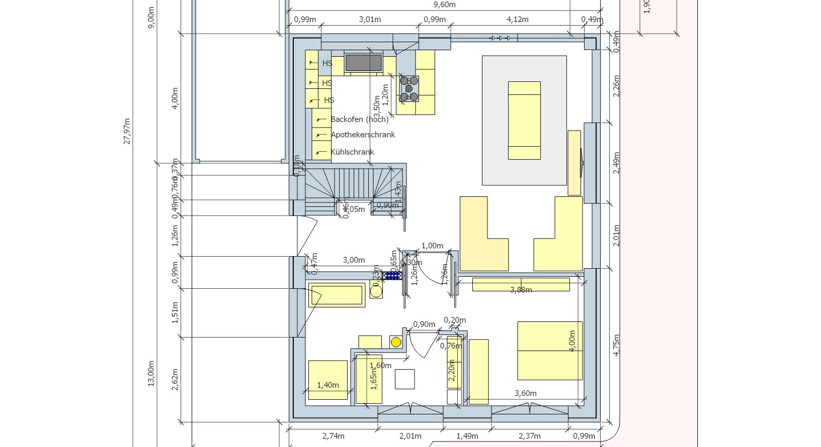 Floor plan of a house: kitchen with island, dining area, living room, stairs, furniture.