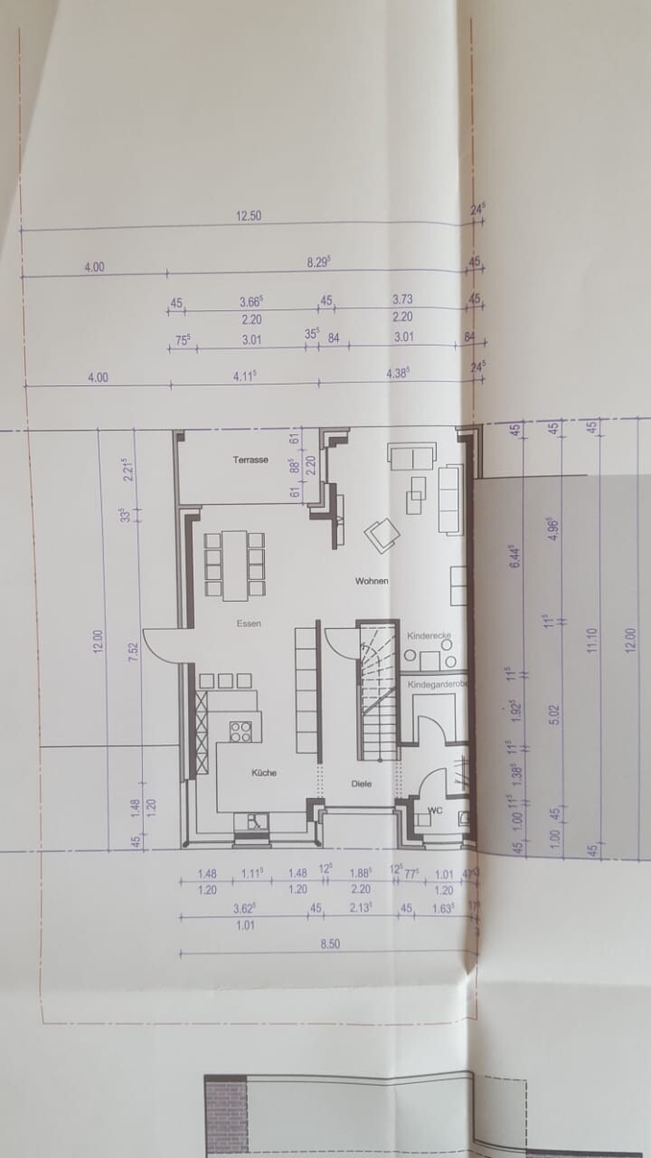 2D floor plan of a house with kitchen, dining area, living room, terrace, and staircase