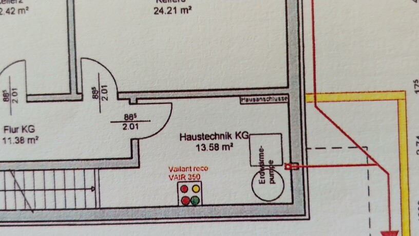 Floor plan of a basement with a utility room, hallway, and doors.
