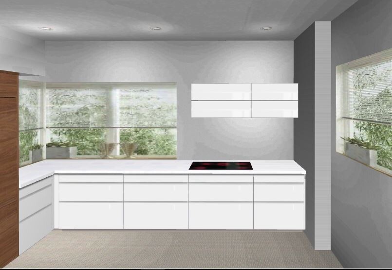 Modern white kitchen with island and induction cooktop, large windows, and white cabinets.