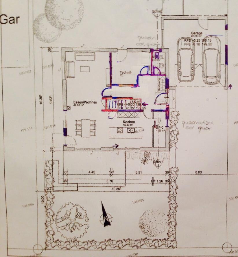 Floor plan of a single-family house with kitchen, dining/living area, utility room, and garage.