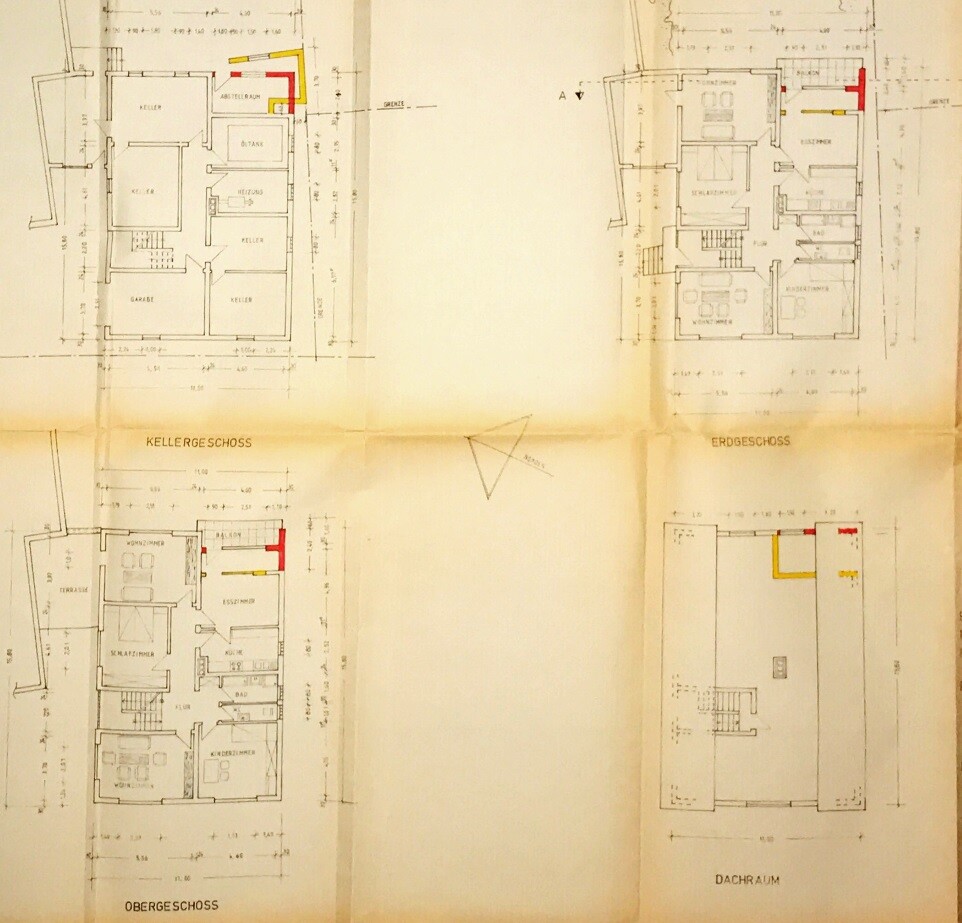 Multi-part building plan with floor plans of basement, ground floor and upper floor.