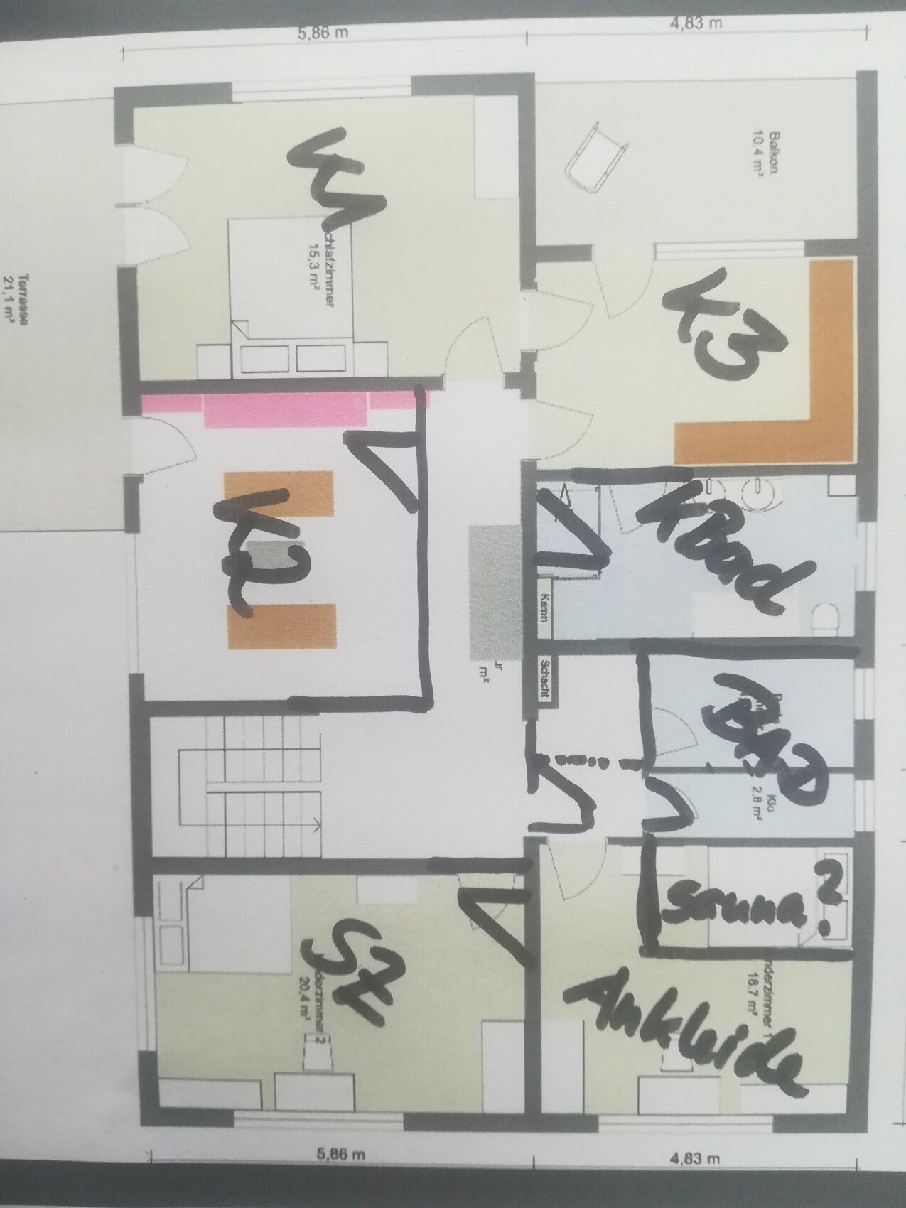 Detailed floor plan with multiple rooms, staircase, and balcony, hand-marked