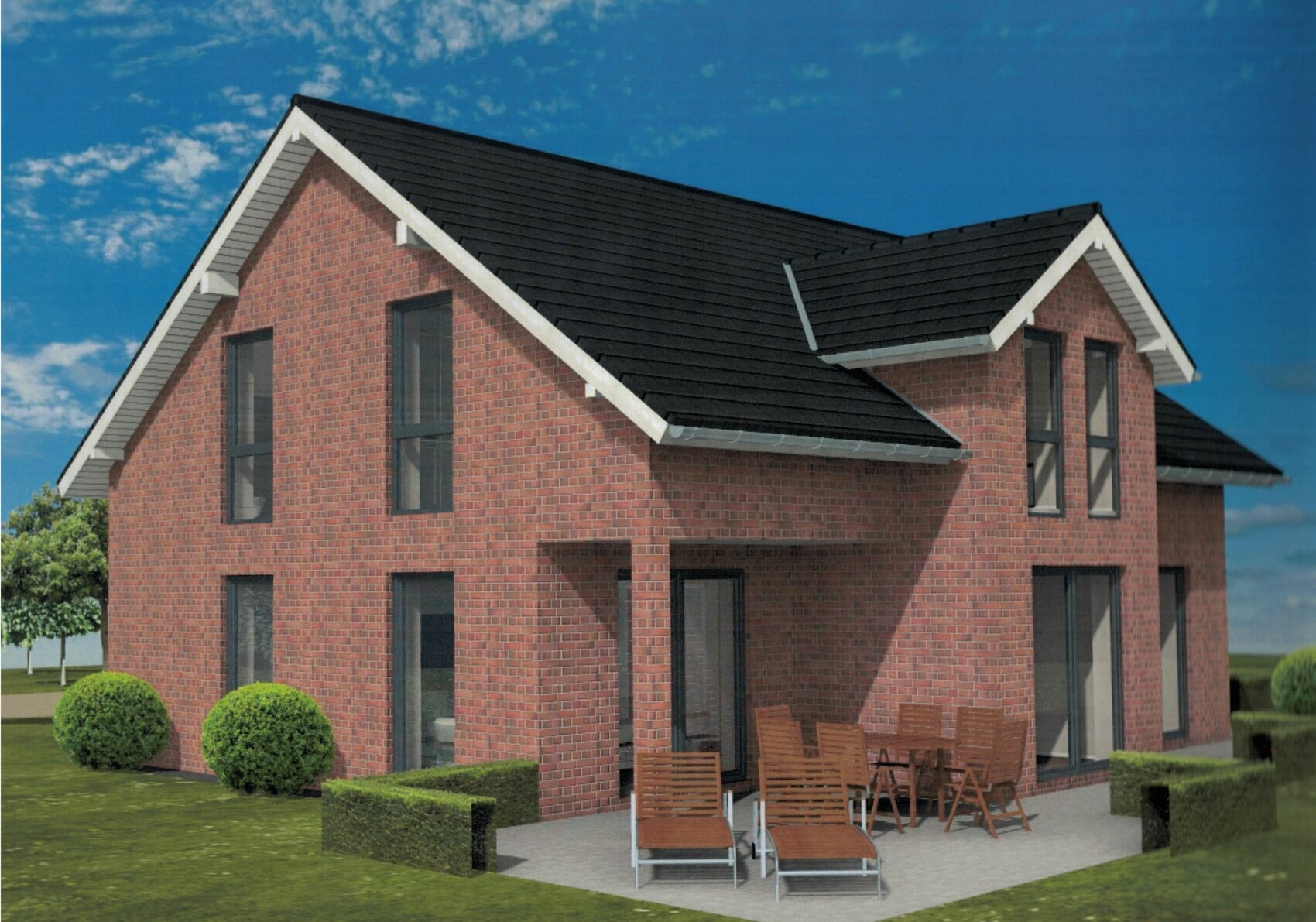 A two-story red brick house with a dark gable roof; terrace with wooden furniture.