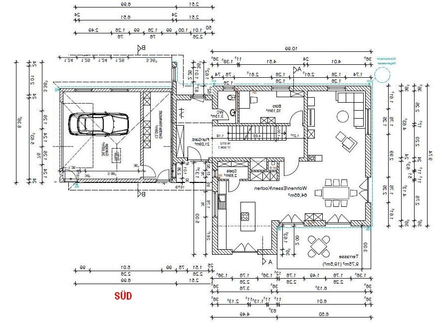 Floor plan of a house: garage with car, open living/dining area, kitchen, staircase, south.