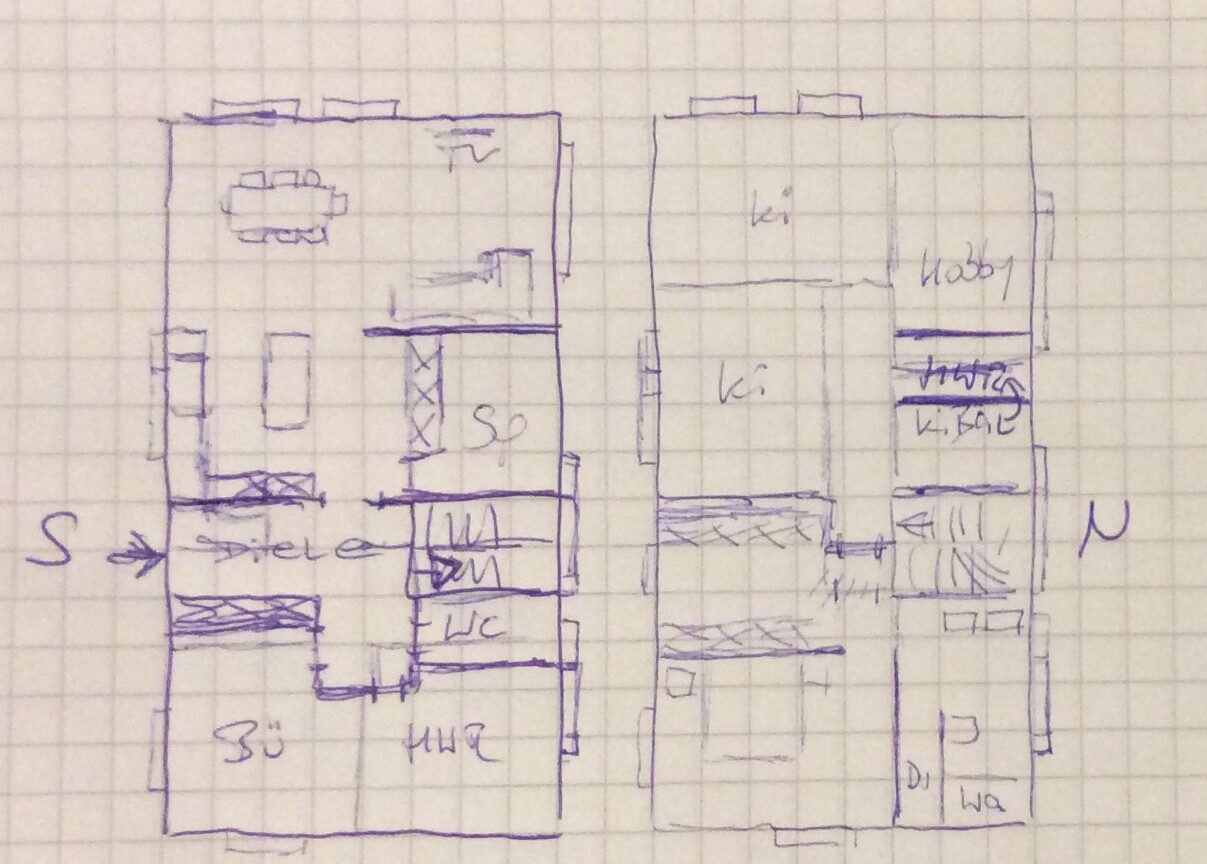 Hand-drawn floor plan sketch of a two-story house with rooms, bathroom, and kitchen