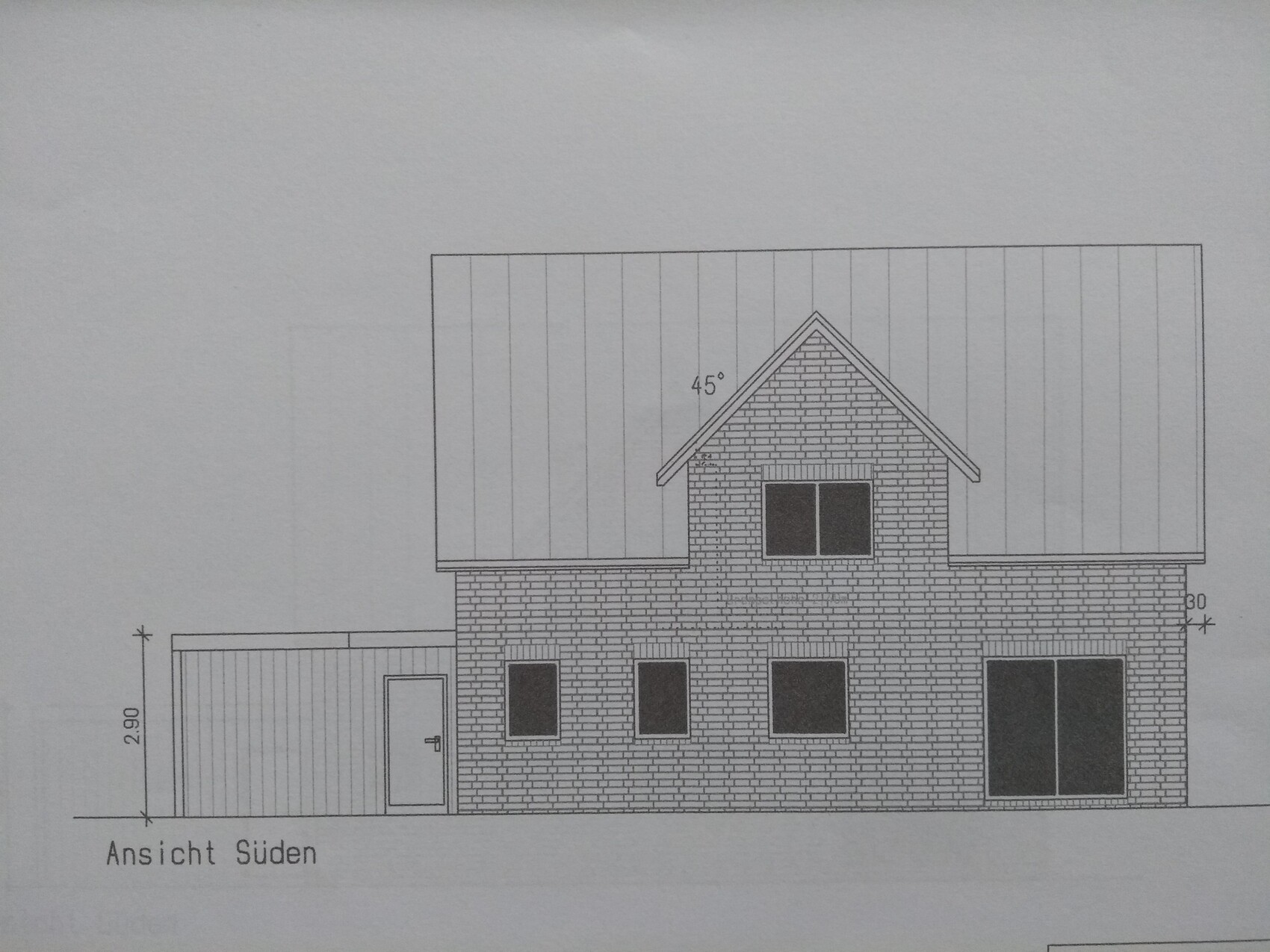 South elevation of a two-story brick house with gable roof, windows and garage on the left.