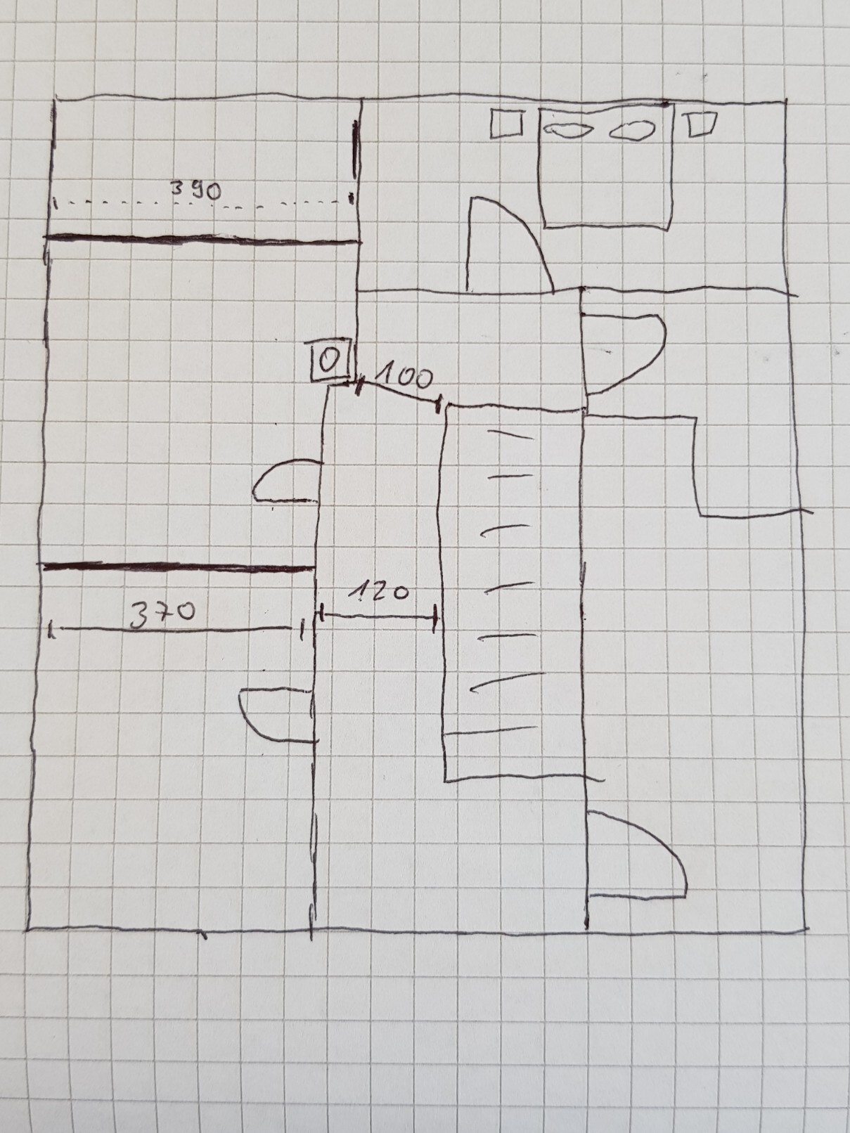 Hand-drawn floor plan sketch of a house with room layouts
