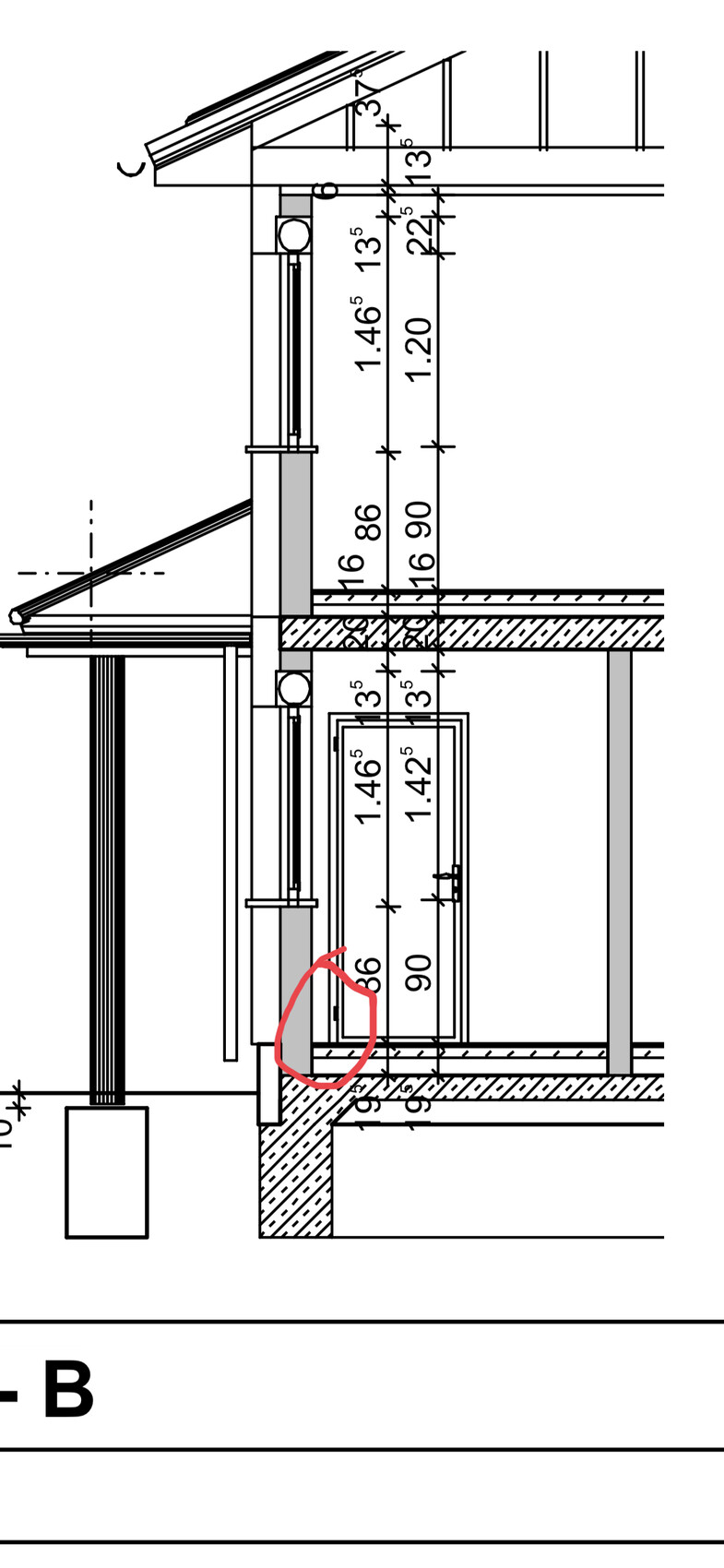 Technical drawing of a wall section with pipe routing and dimensions