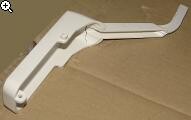 White plastic fastening clip with curved shape and screw holes at both ends