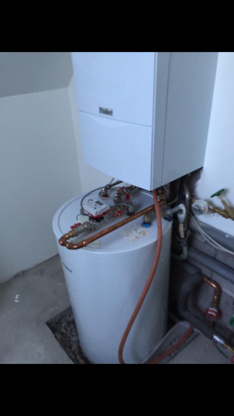 Heating system with boiler and copper pipes in the basement
