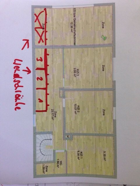 Floor plan of a house with several rooms and dimensions indicated on the plan