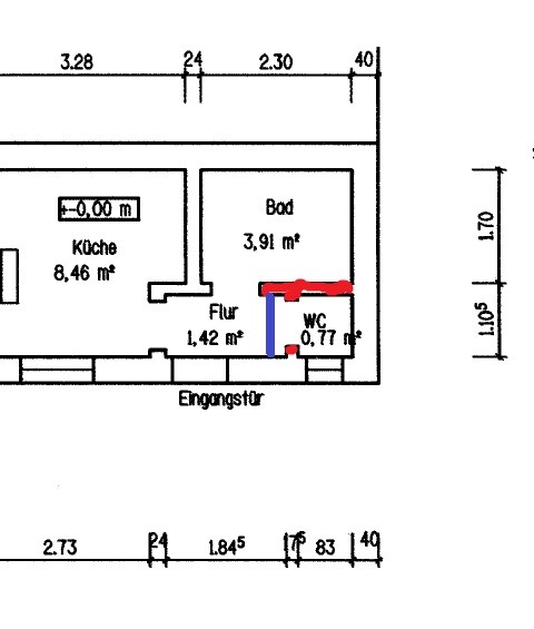 Floor plan of a house with kitchen, bathroom, hallway, and entrance area.