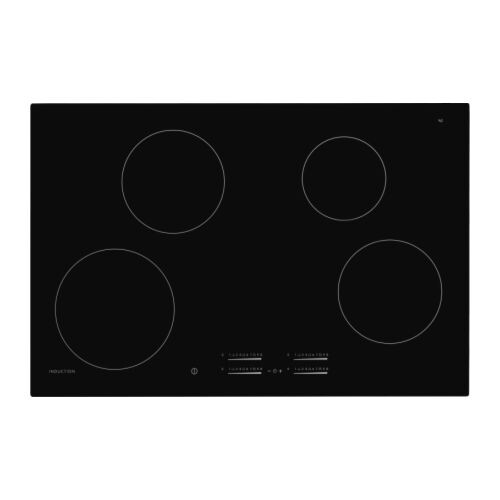 Induction cooktop with four cooking zones in a modern kitchen