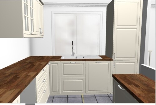 Kitchen with white fronts, wooden countertops, central sink and freestanding counter.
