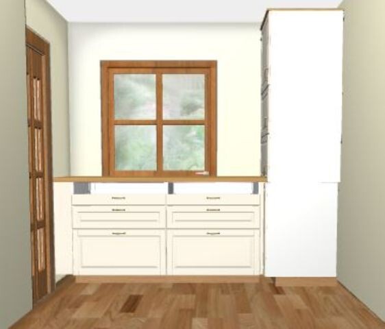 Kitchen with white cabinets, wooden window, wood floor, and tall cabinet on the right.