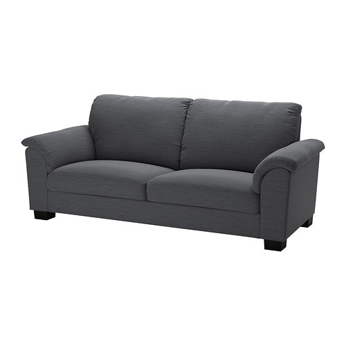 Grey upholstered fabric sofa with two seat cushions, two back cushions, and wide armrests