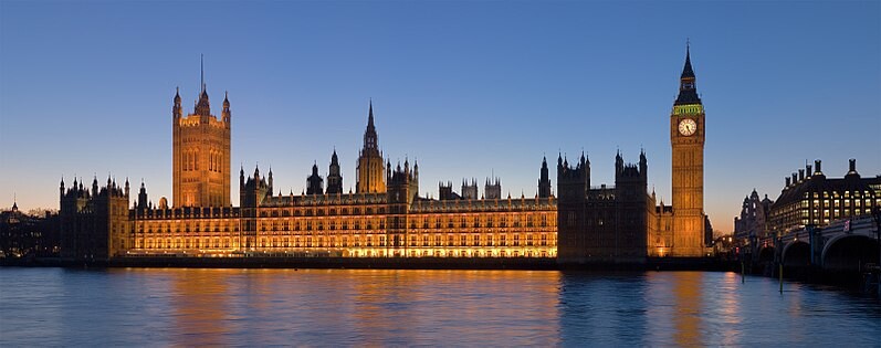 Evening light over the Houses of Parliament in London with Big Ben and the Thames.