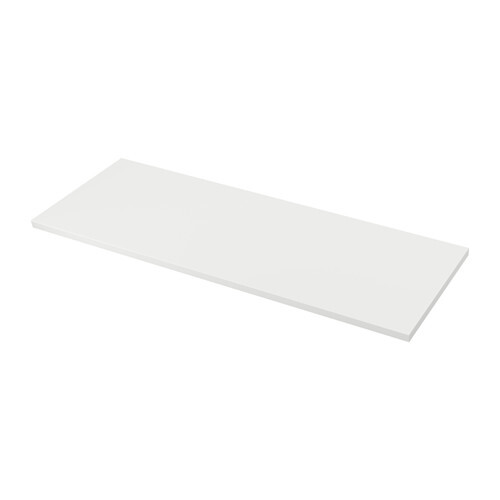 Long, flat, rectangular white countertop shown from an angle on a white background.