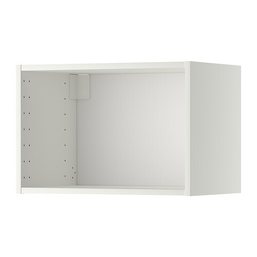 White wall-mounted cabinet, open and empty, left side with pegboard for adjustable shelves
