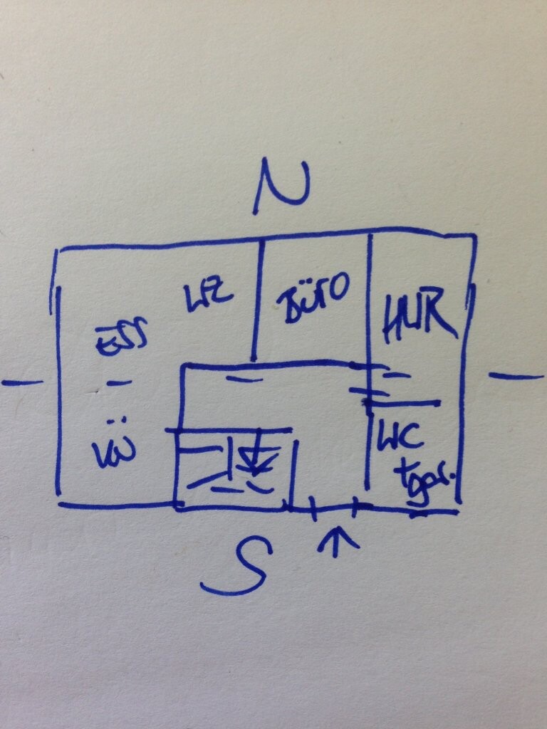Hand-drawn floor plan of an apartment with living area, dining room, office, utility room, and WC; north at the top.