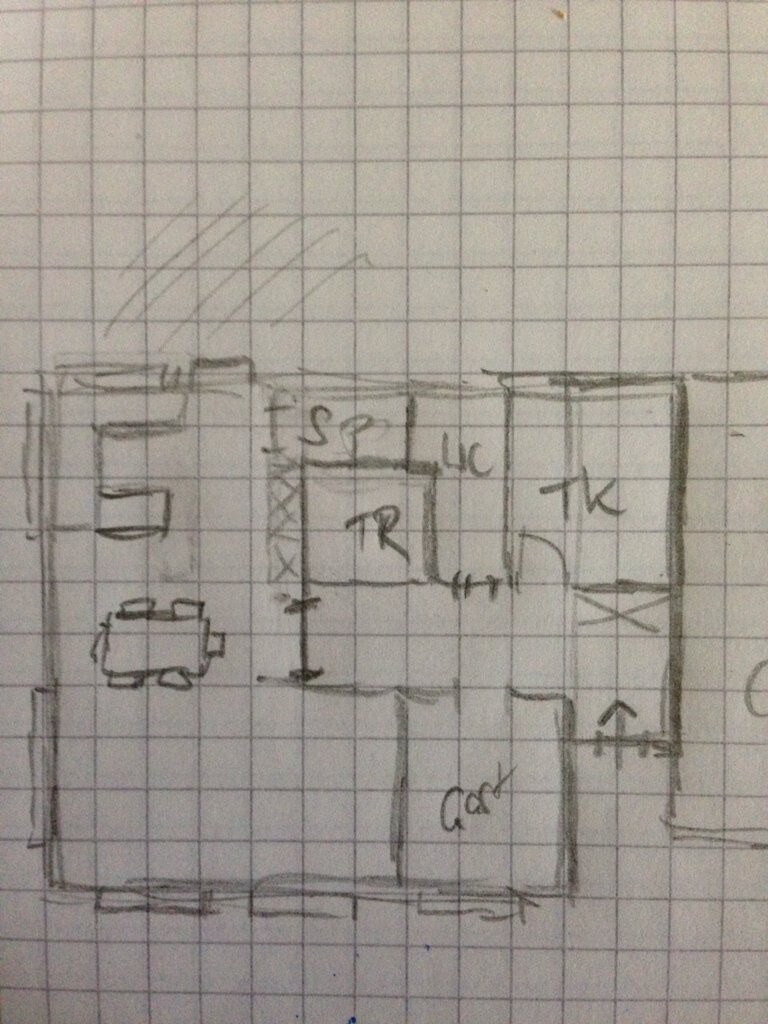 Sketch of an apartment floor plan: dining nook on the left, central rooms, kitchen on the right.