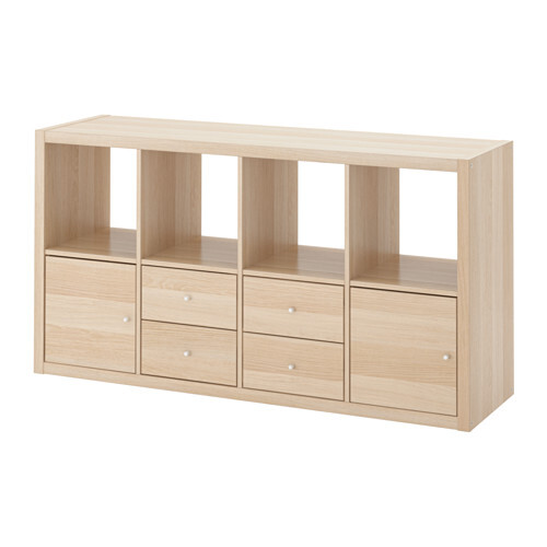 Wooden shelf with four open compartments on top and four drawers below.
